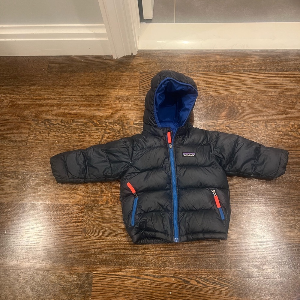 Patagonia Kids' Black Puffer Jacket with Blue and Red Details